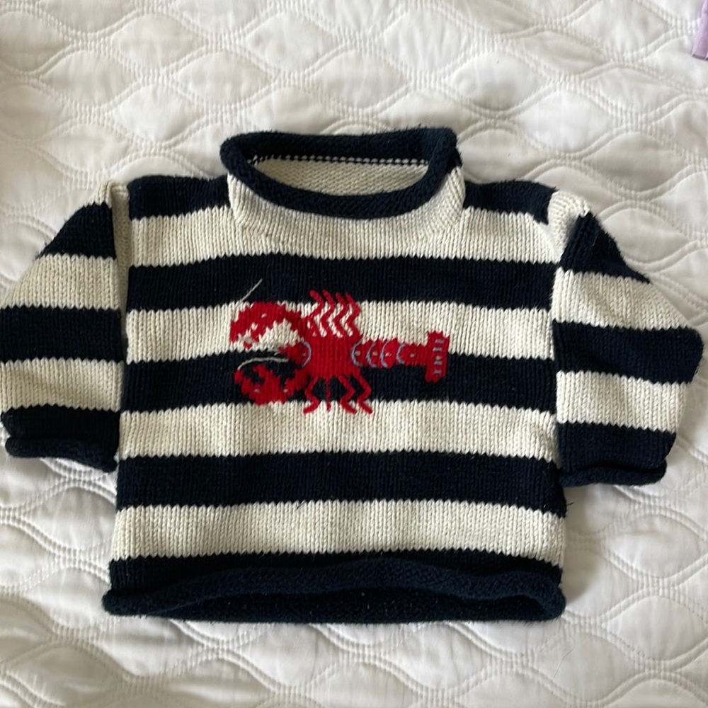 Claver roll neck lobster sweater